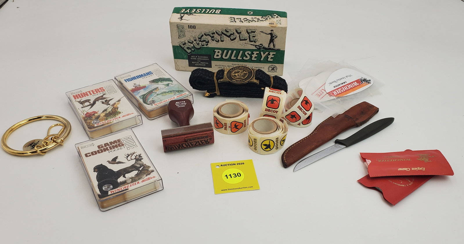 Large lot of misc ites, including Winchester pocket guide books, stamp, and belt (1 of 1)
