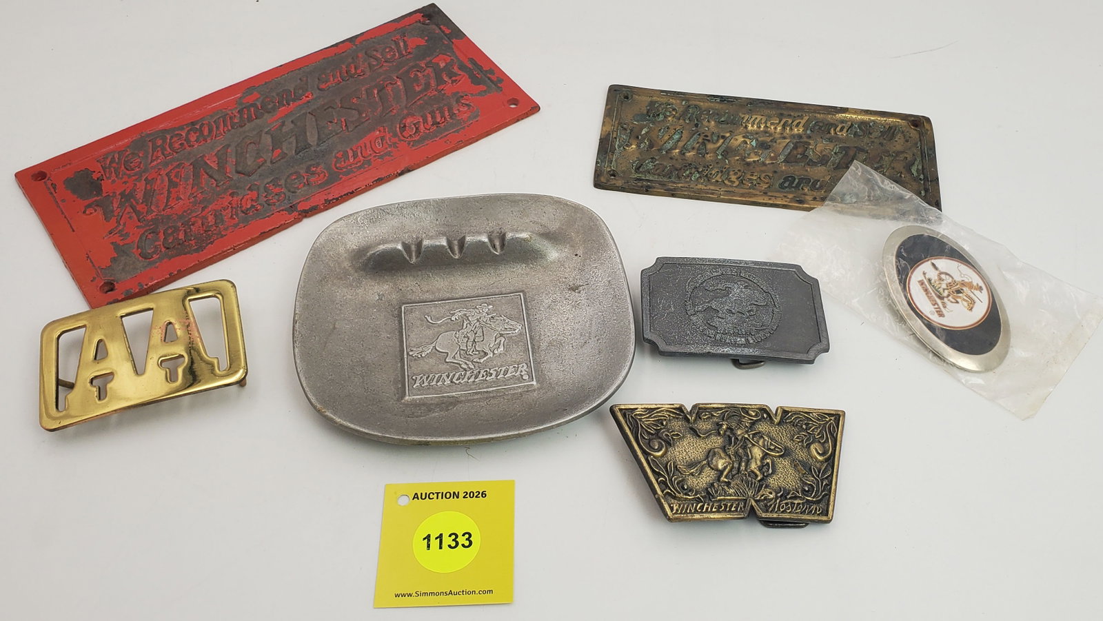 Lot of 7, including Winchester ash tray, sign and belt buckles (1 of 1)