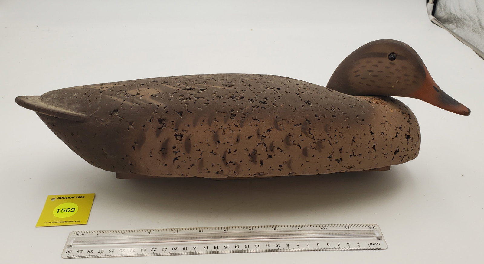 Decoy, duck with cork body and wooden carved head, on bottom "D. Johnson" (1 of 3)