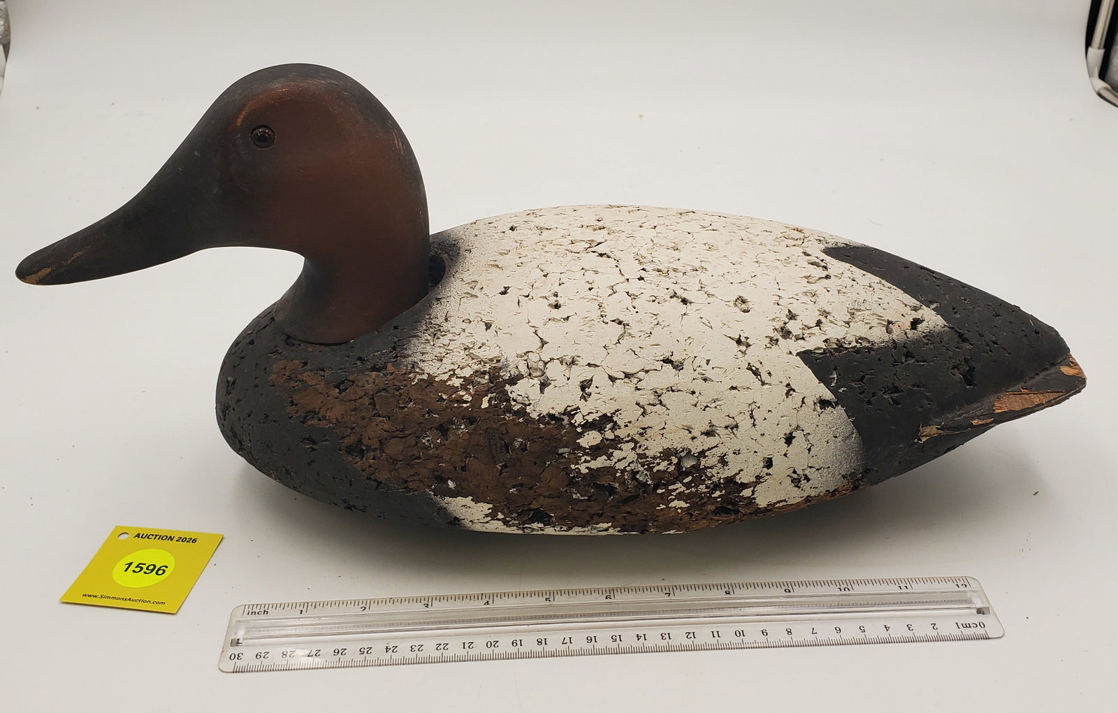 Decoy, canvasback drake w/cork body and wooden head, marked on bottom "Waverider" (1 of 3)