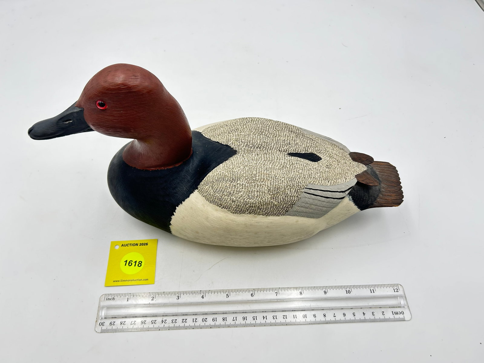 Decoy, Wooden Canvasback Drake duck. On bottom is carved "B.WAII 1-21-81 - 2