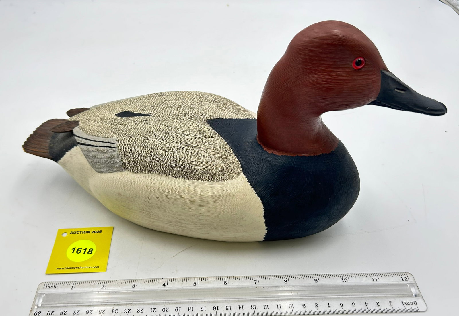 Decoy, Wooden Canvasback Drake duck. On bottom is carved "B.WAII 1-21-81 - 3