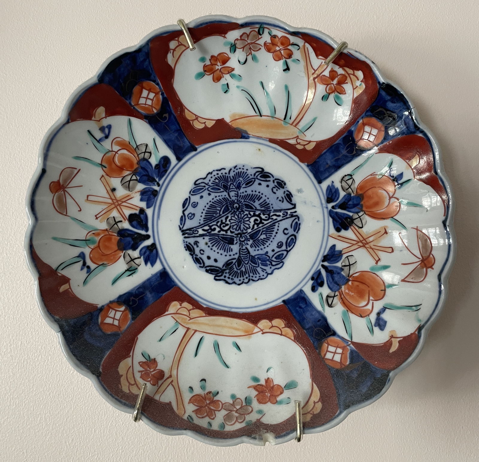 Japanese Imari porcelain 8.25" charger, featuring a scalloped edge and hand-painted designs in (1 of 6)