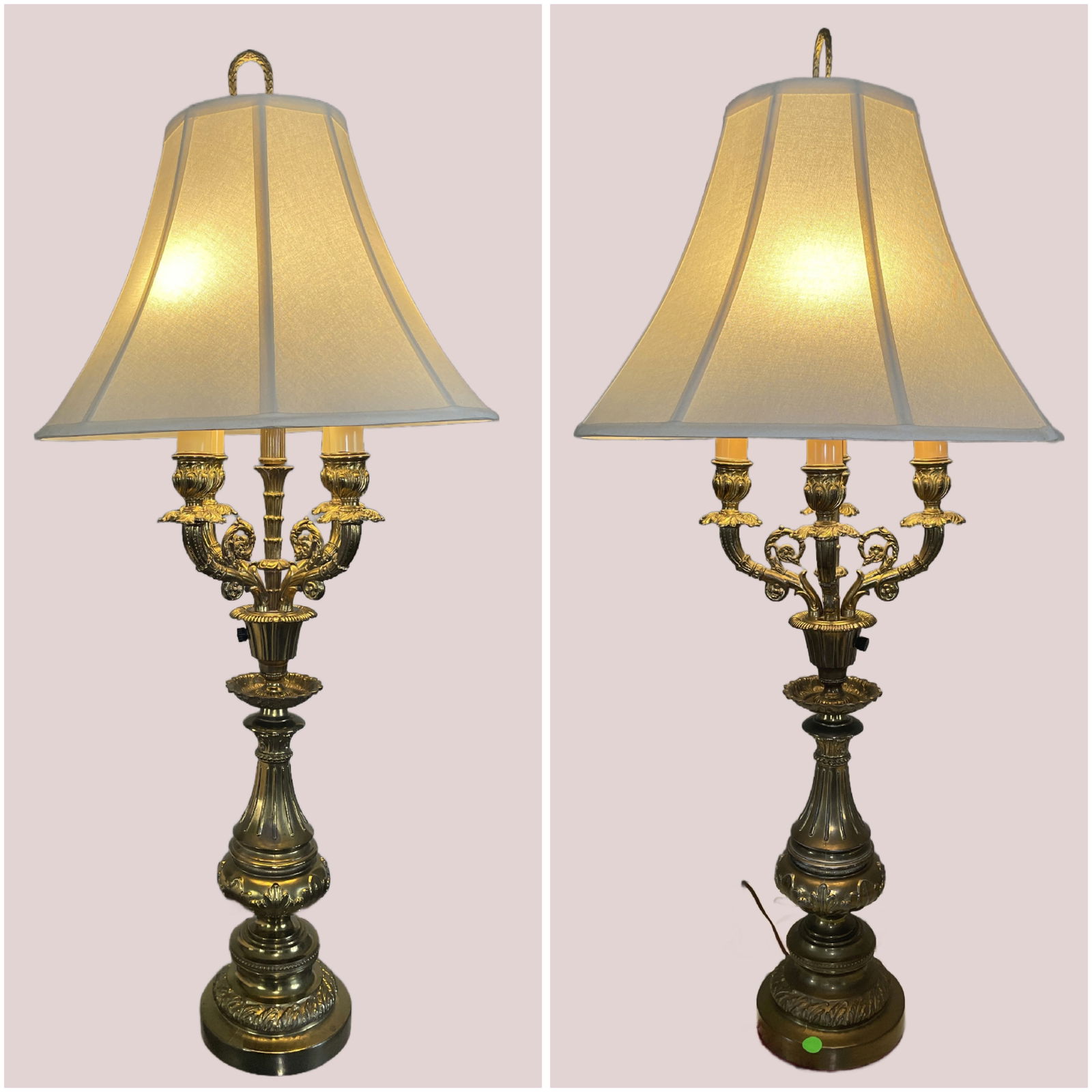 Pair of vintage or antique baroque revival style brass candelabra table lamp: Vintage or antique baroque revival style brass candelabra table lamp, often featuring ornate details like cherubs and cherub motifs. These lamps are typically crafted from solid brass or gilded bronze