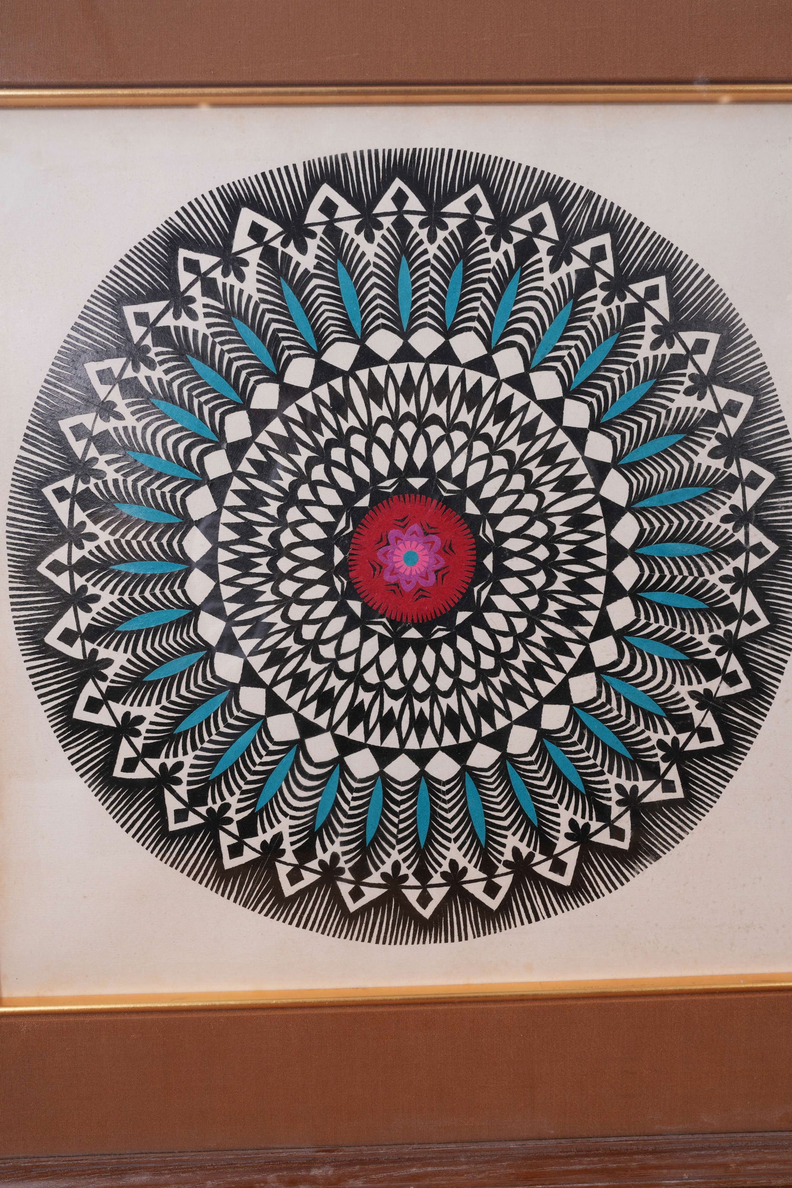 A PAPER-CUT ARTWORK ON PAPER: Paper-cut artwork on paper