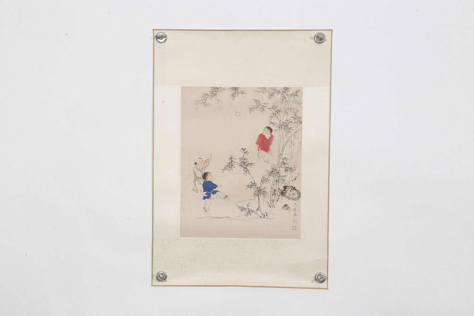 A INFANT PLAY PAINTING ON SILK (MOUNTED AS A HANGING HEART) BY WU GUANGYU.吳光宇: Infant Play Painting on Silk (Mounted as a Hanging Heart) by Wu Guangyu.吳光宇