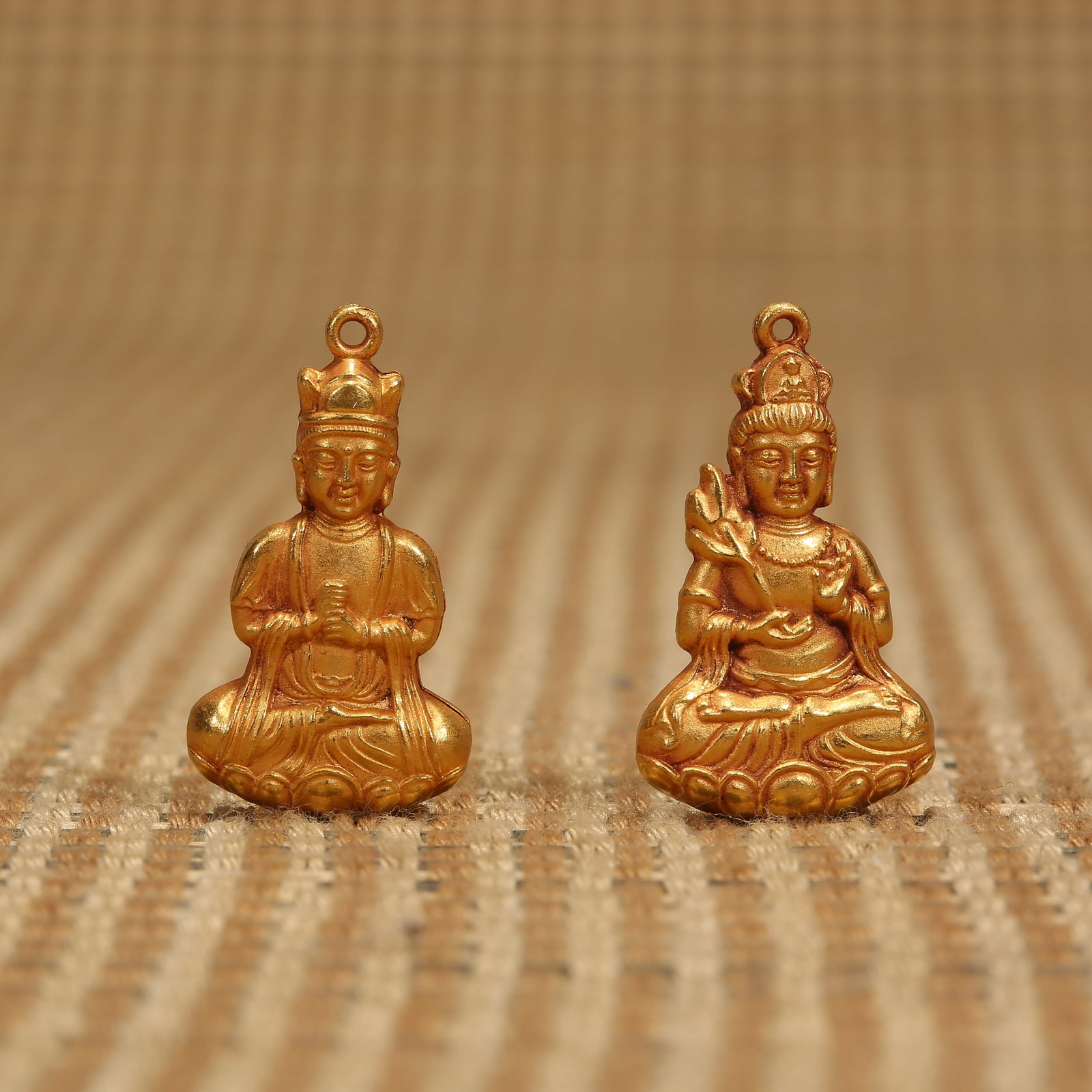 A LIAO–JIN DYNASTY SET OF PURE GOLD BODHISATTVA PENDANTS (1 of 7)