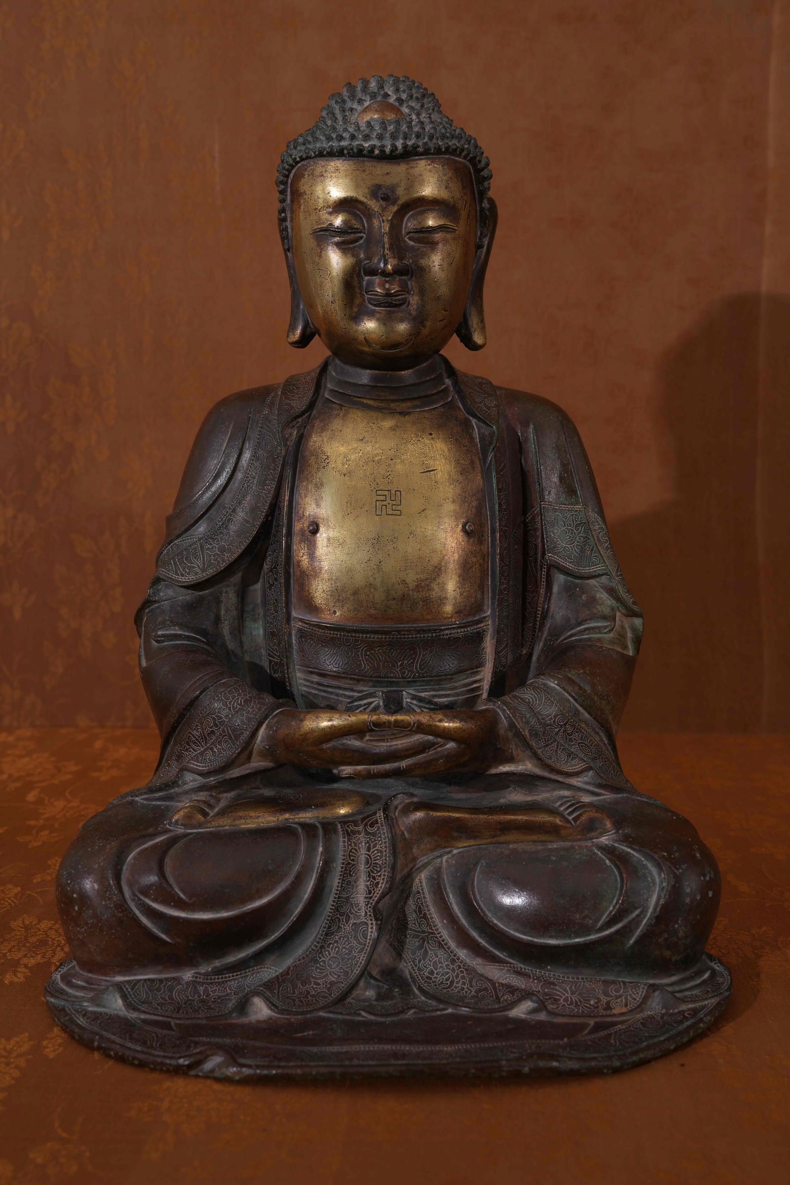 A MING DYNASTY GILT-BRONZE SHAKYAMUNI BUDDHA STATUE (1 of 13)