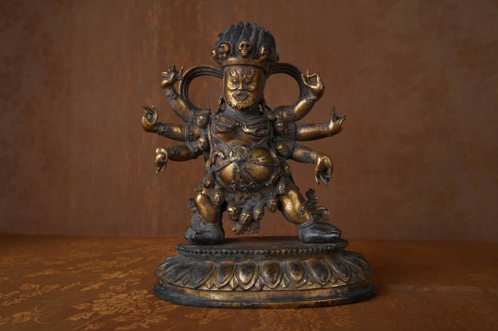 A GILT-BRONZE MAH?K?LA STATUE (1 of 8)