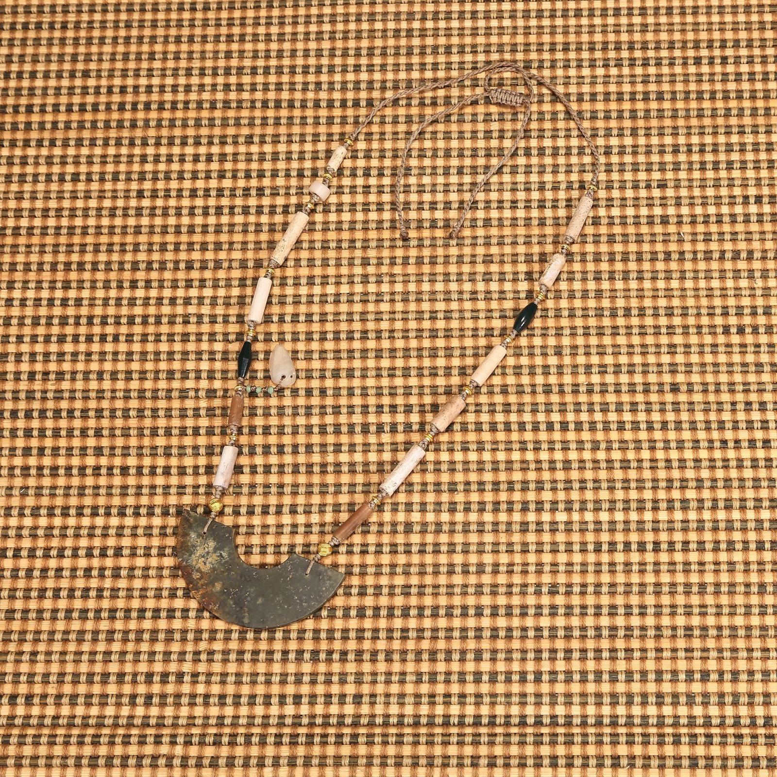 A ANCIENT JADE HUANG PENDANT NECKLACE: Ancient jade huang pendant necklace