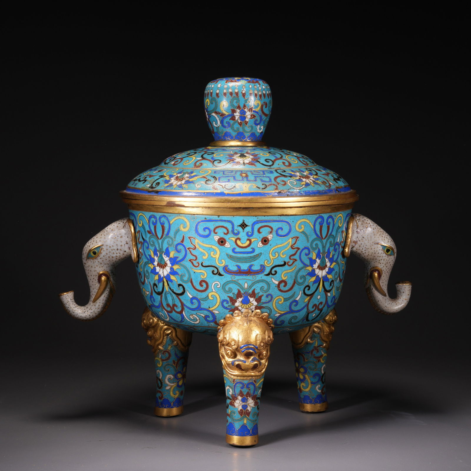 A QING DYNASTY CLOISONNÉ ENAMEL ELEPHANT-HANDLED CENSER WITH PASSIONFLOWER PATTERN (1 of 9)