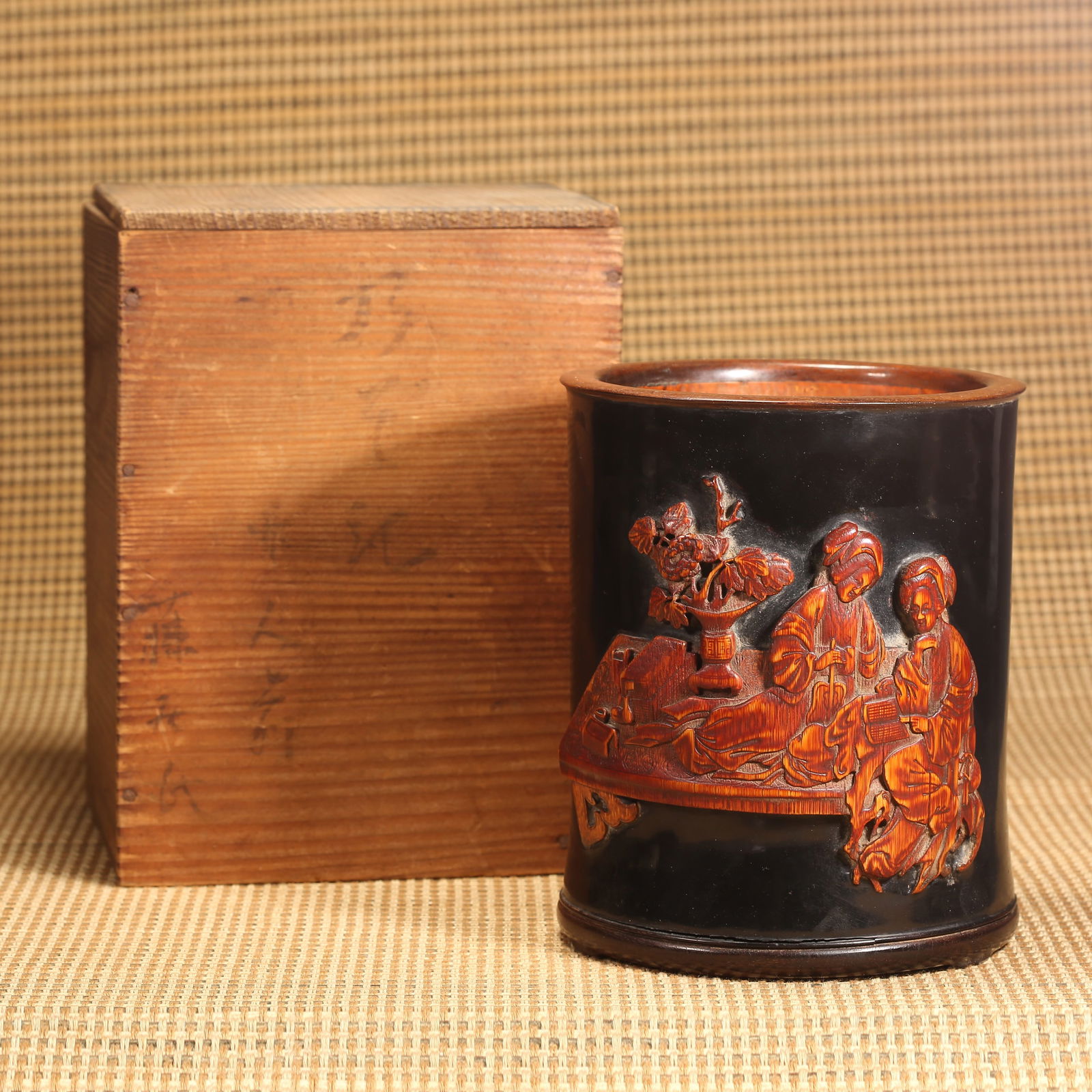 A QING DYNASTY BAMBOO-CARVED BRUSH HOLDER WITH LADY FIGURE BY WU ZHIFAN: Qing Dynasty Bamboo-Carved Brush Holder with Lady Figure by Wu Zhifan