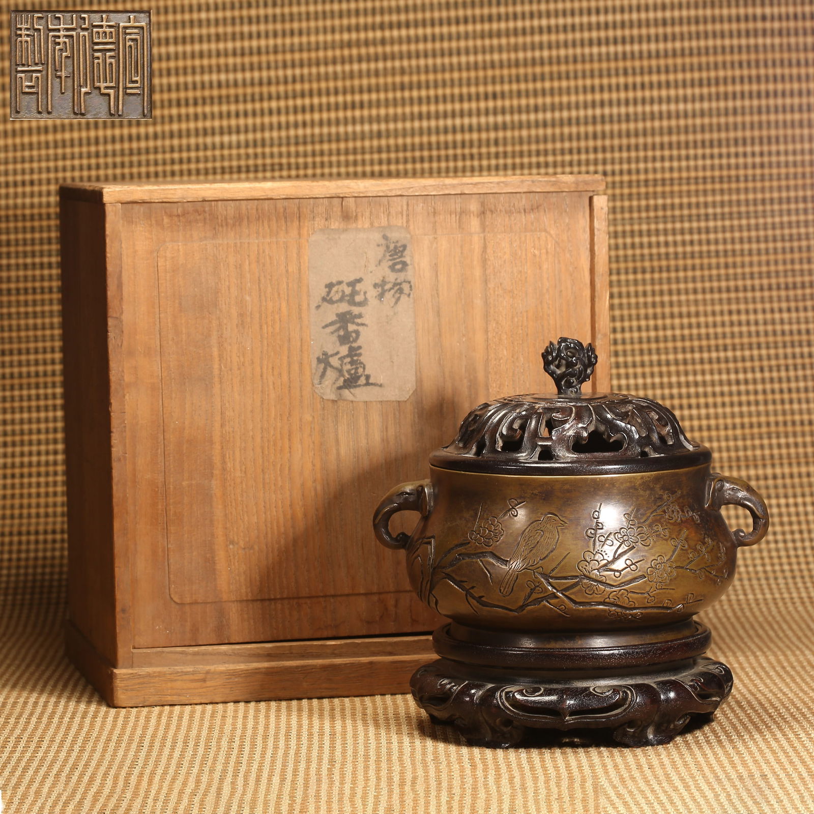A QING DYNASTY BRONZE CENSER WITH ELEPHANT-HEAD HANDLES AND CHESS SCENE: Qing Dynasty Bronze Censer with Elephant-Head Handles and Chess Scene