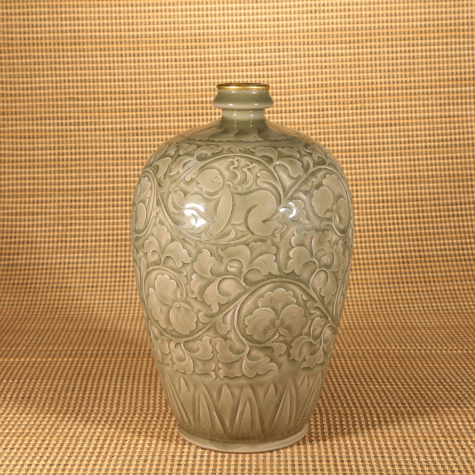 A SONG DYNASTY YAOZHOU WARE CARVED PLUM VASE (1 of 9)