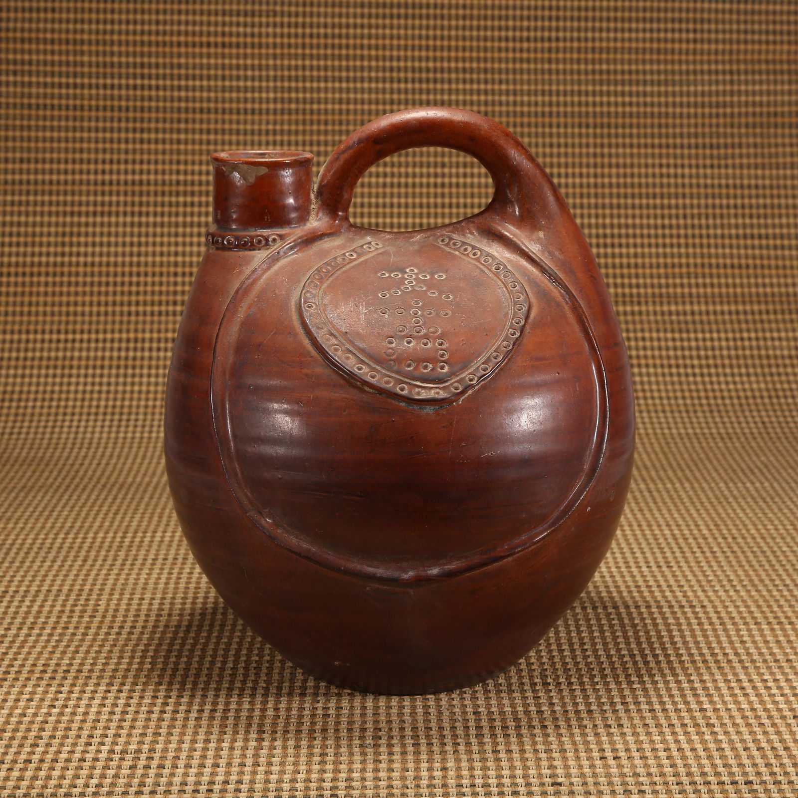 A LIAO DYNASTY BROWN-GLAZED BELLOW-SHAPED EWER (1 of 9)