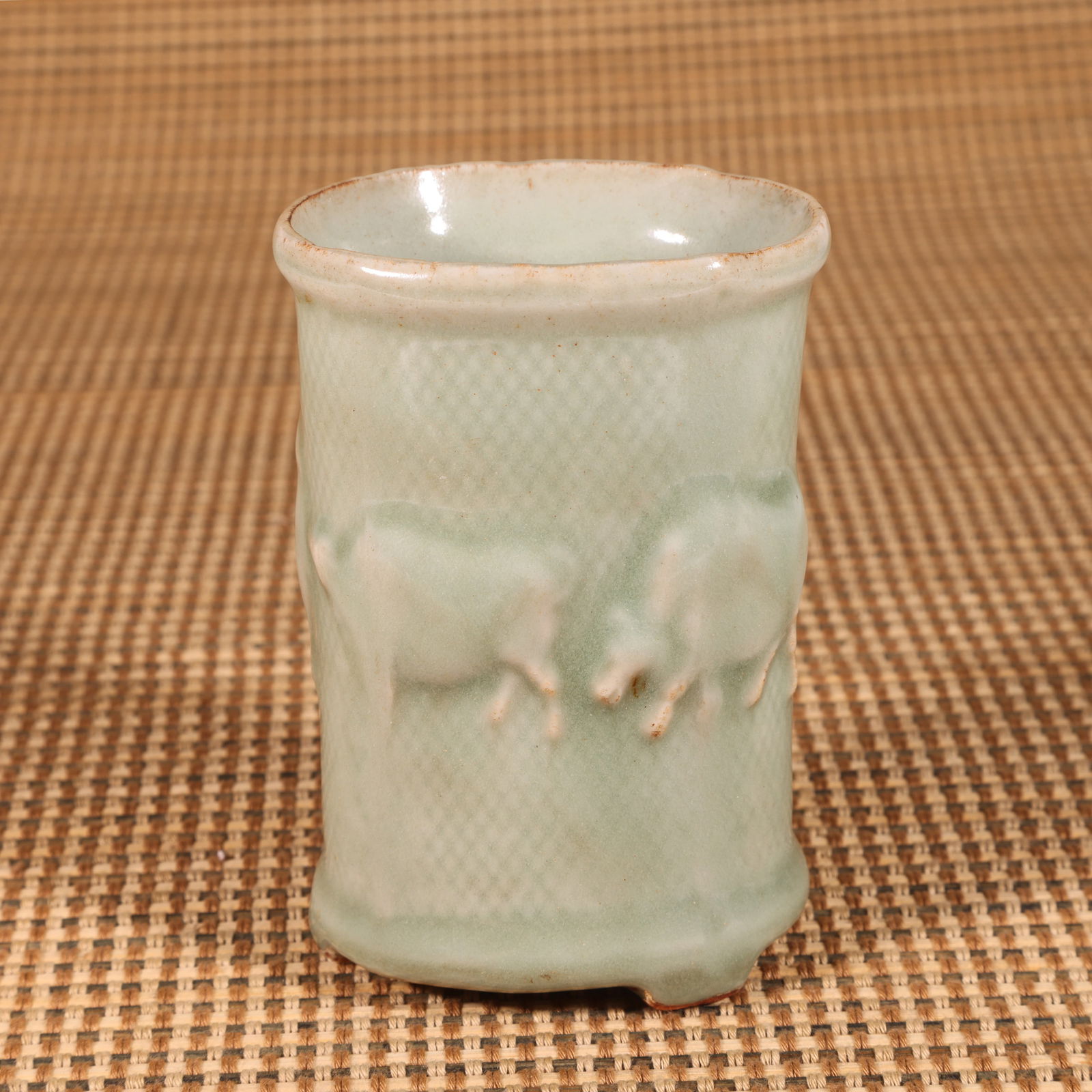 A SONG DYNASTY LONGQUAN WARE BRUSH HOLDER WITH FIVE OXEN MOTIF (1 of 8)