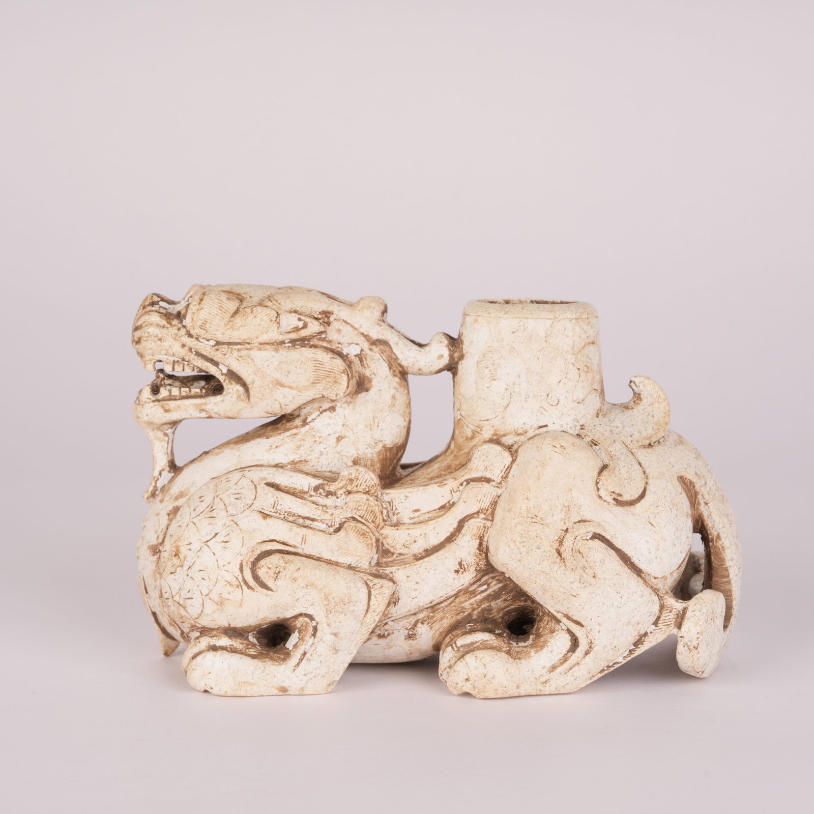 A JADE GUARDIAN FIGURE, WARRING STATES PERIOD: Jade Guardian Figure, Warring States Period