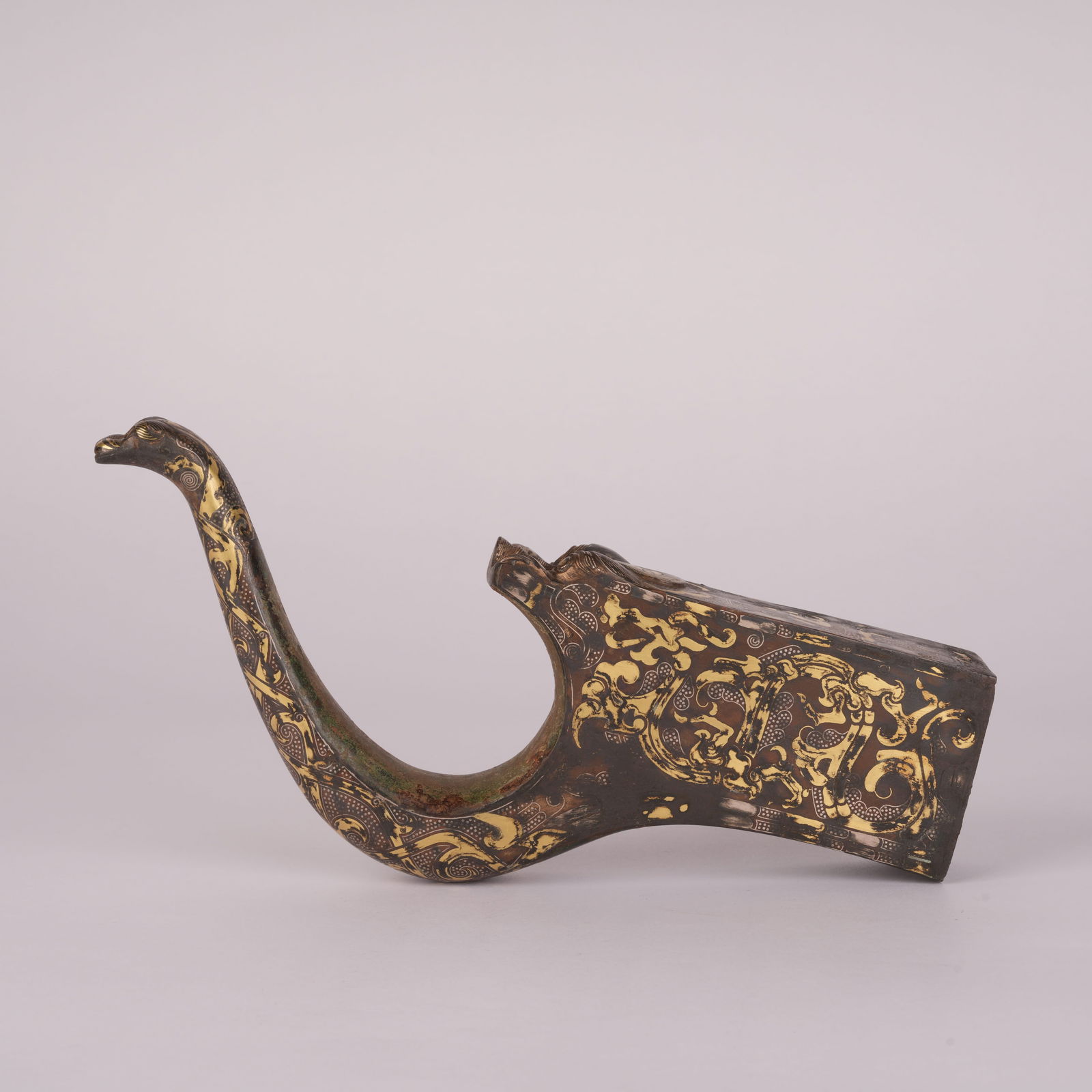 A GILT-SILVER BRONZE BOW STAND, WARRING STATES PERIOD (1 of 9)