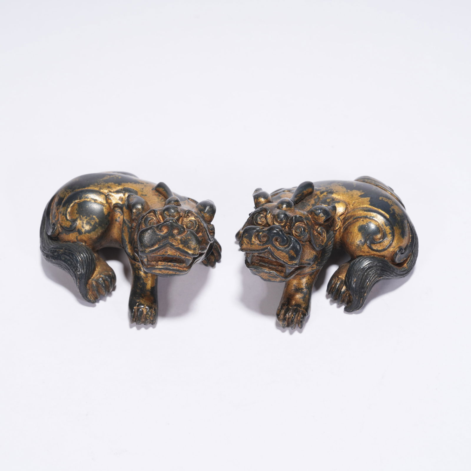 A GROUP OF GILT-BRONZE MYTHICAL BEAST ORNAMENTS (1 of 8)