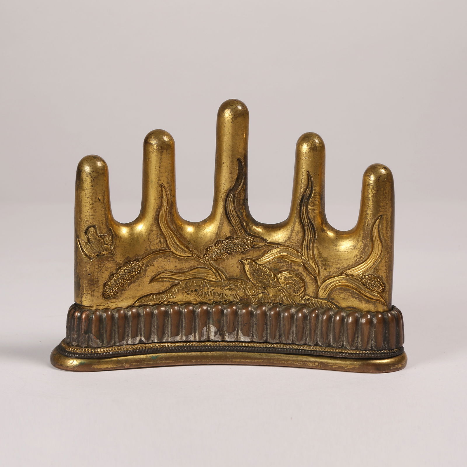 A GILT BRONZE BRUSH REST WITH FLORAL AND BIRD MOTIF (1 of 10)