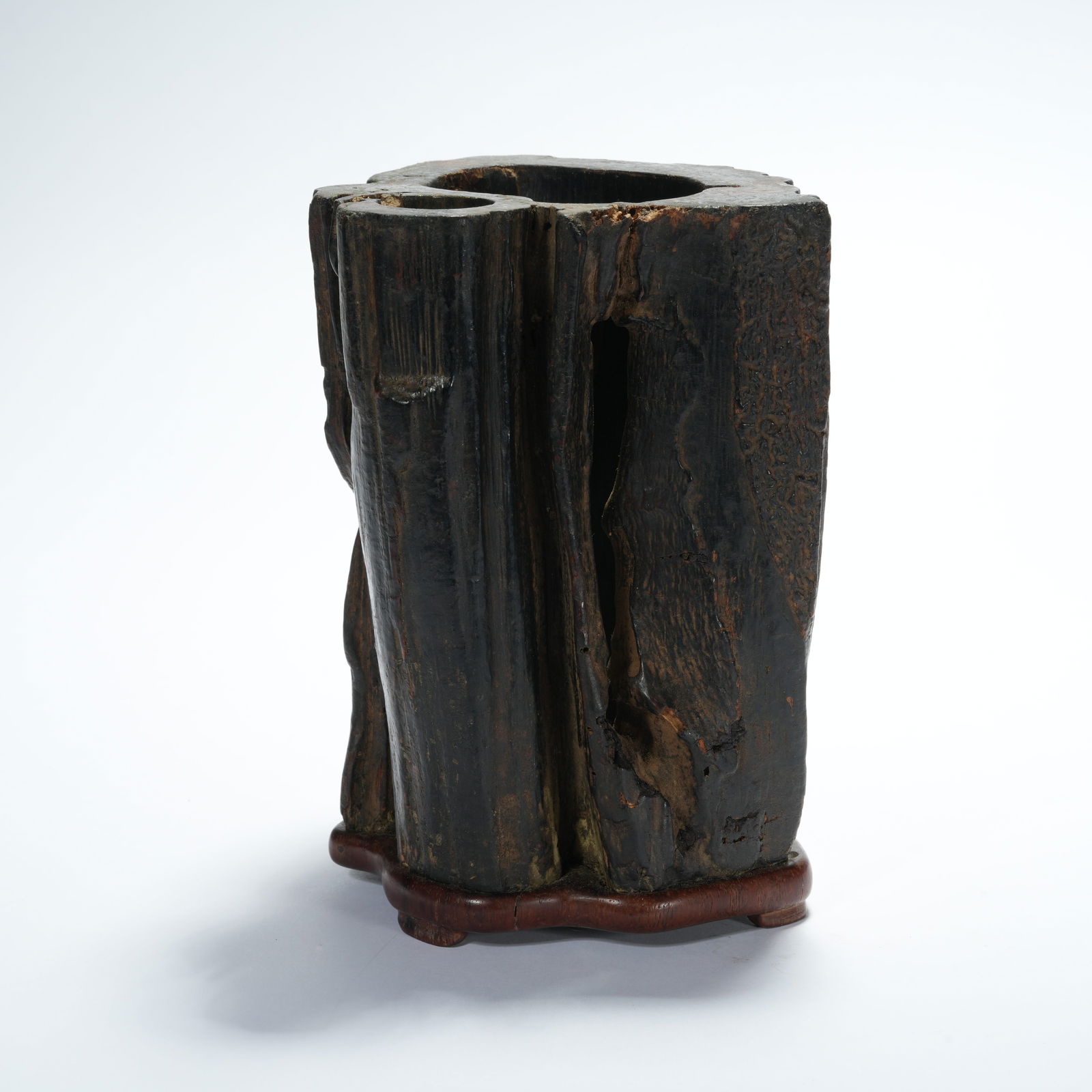 A AGARWOOD CARVED FREEFORM BRUSH POT: Agarwood Carved Freeform Brush Pot
