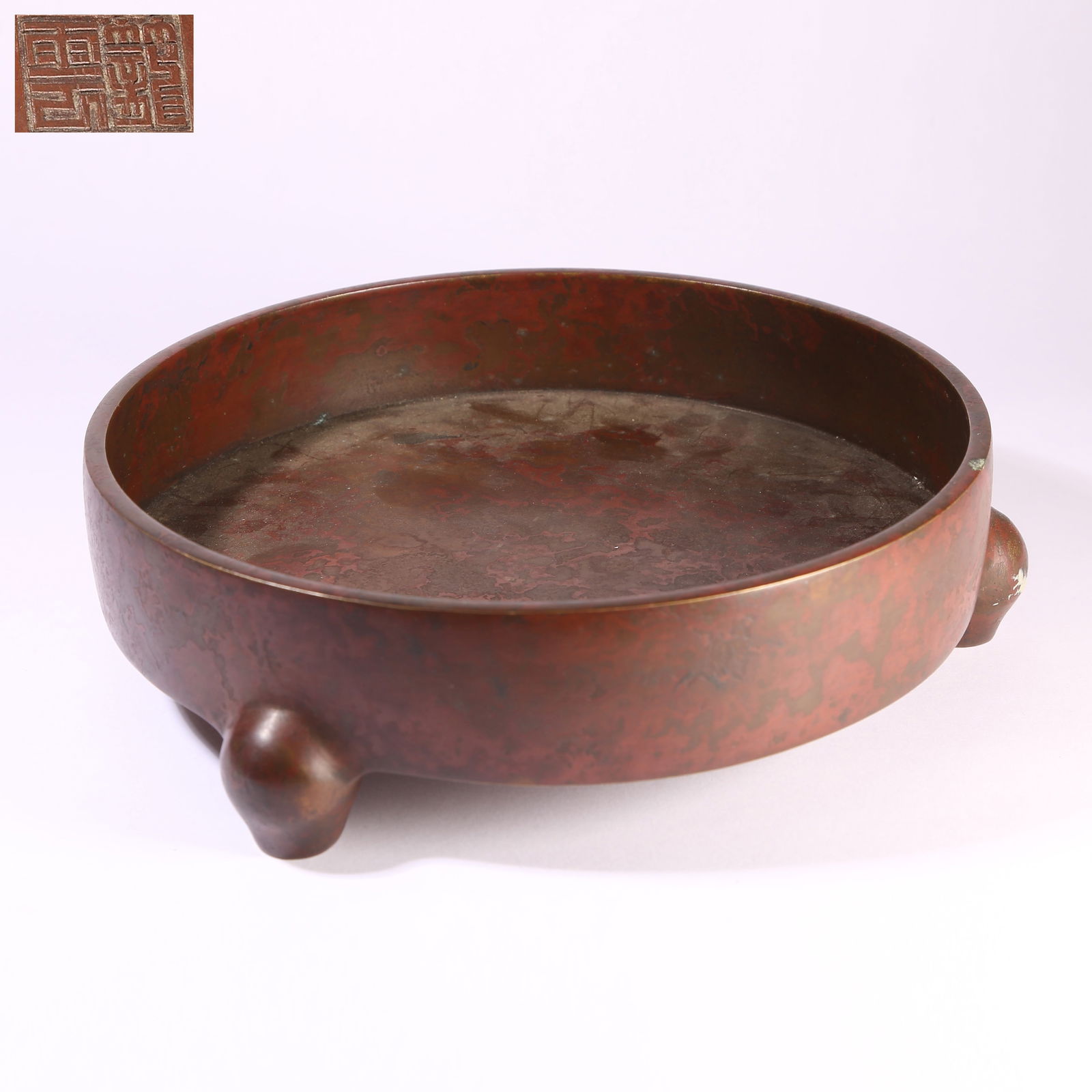 A THREE-LEGGED BRONZE BRUSH WASHER: Three-Legged Bronze Brush Washer