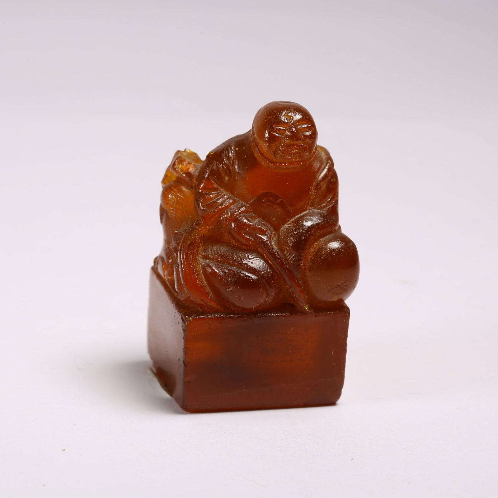 A AMBER SEAL WITH ARHAT FINIAL (1 of 8)