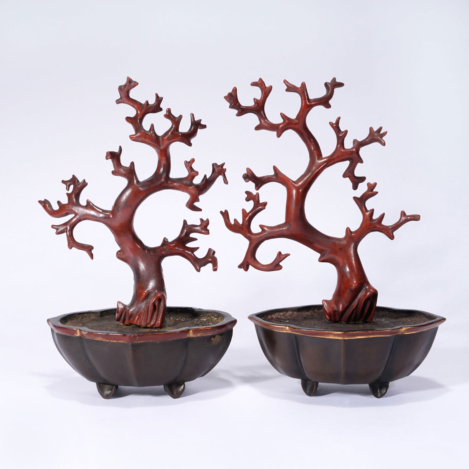 A GROUP OF RED-LACQUER BONSAI ORNAMENTS: Group of Red-Lacquer Bonsai Ornaments