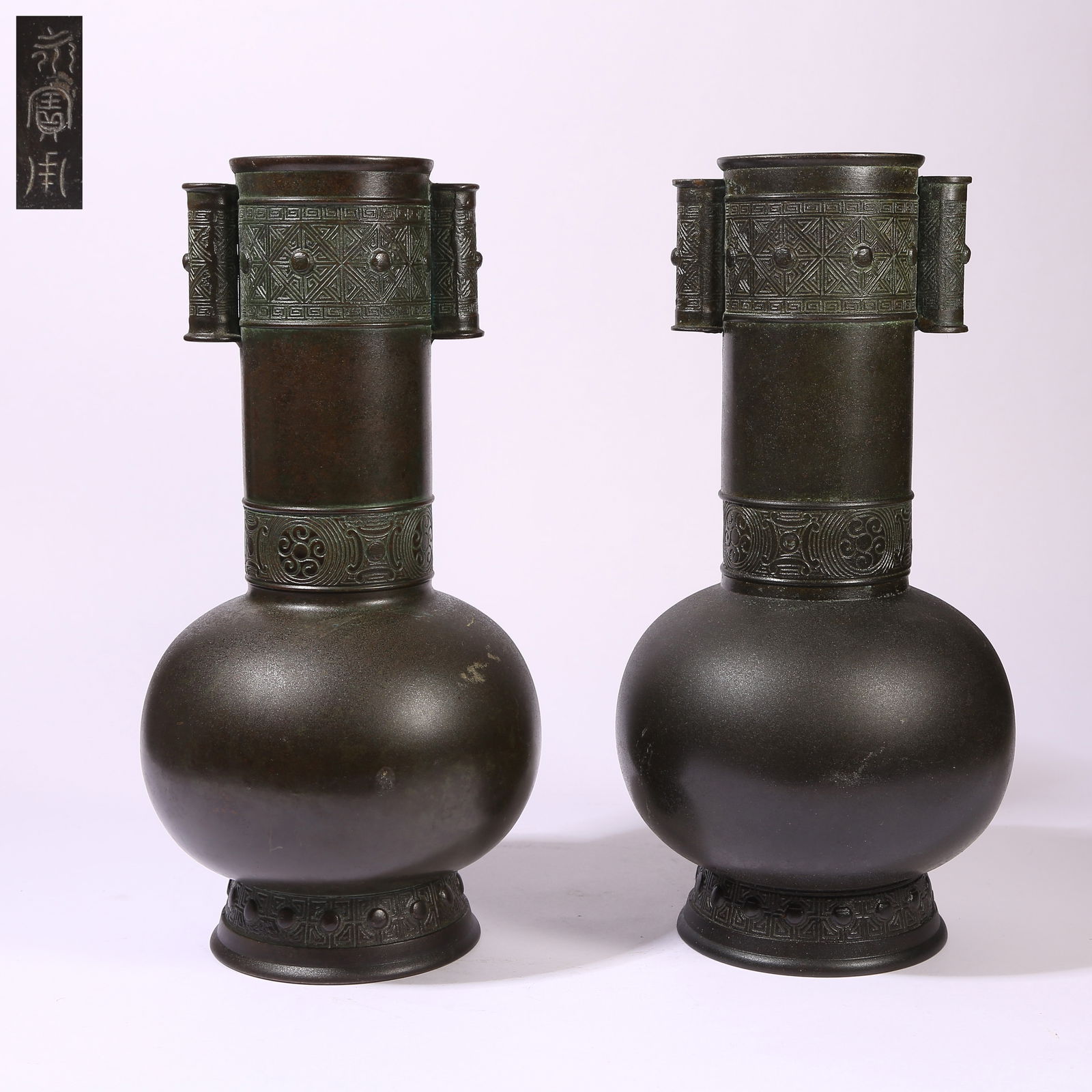 A SET OF BRONZE FLAT-HANDLED VASES (1 of 10)