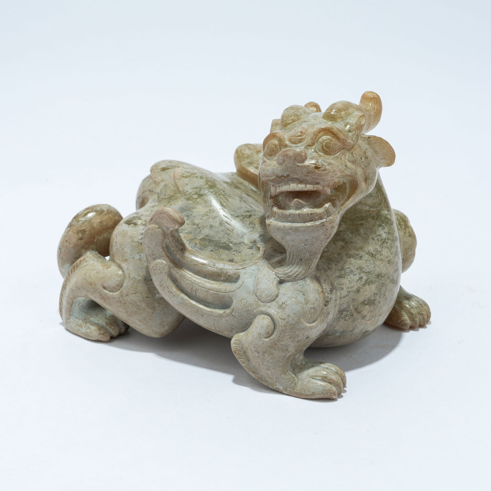 A ARCHAIC JADE CARVED BIXIE FIGURE: Archaic Jade Carved Bixie Figure