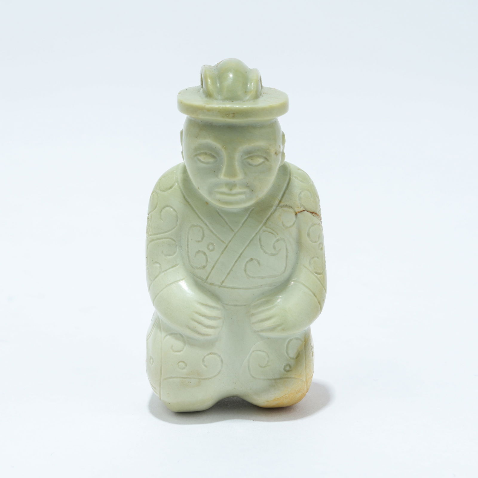 A TURQUOISE CARVED FIGURE ORNAMENT: Turquoise Carved Figure Ornament