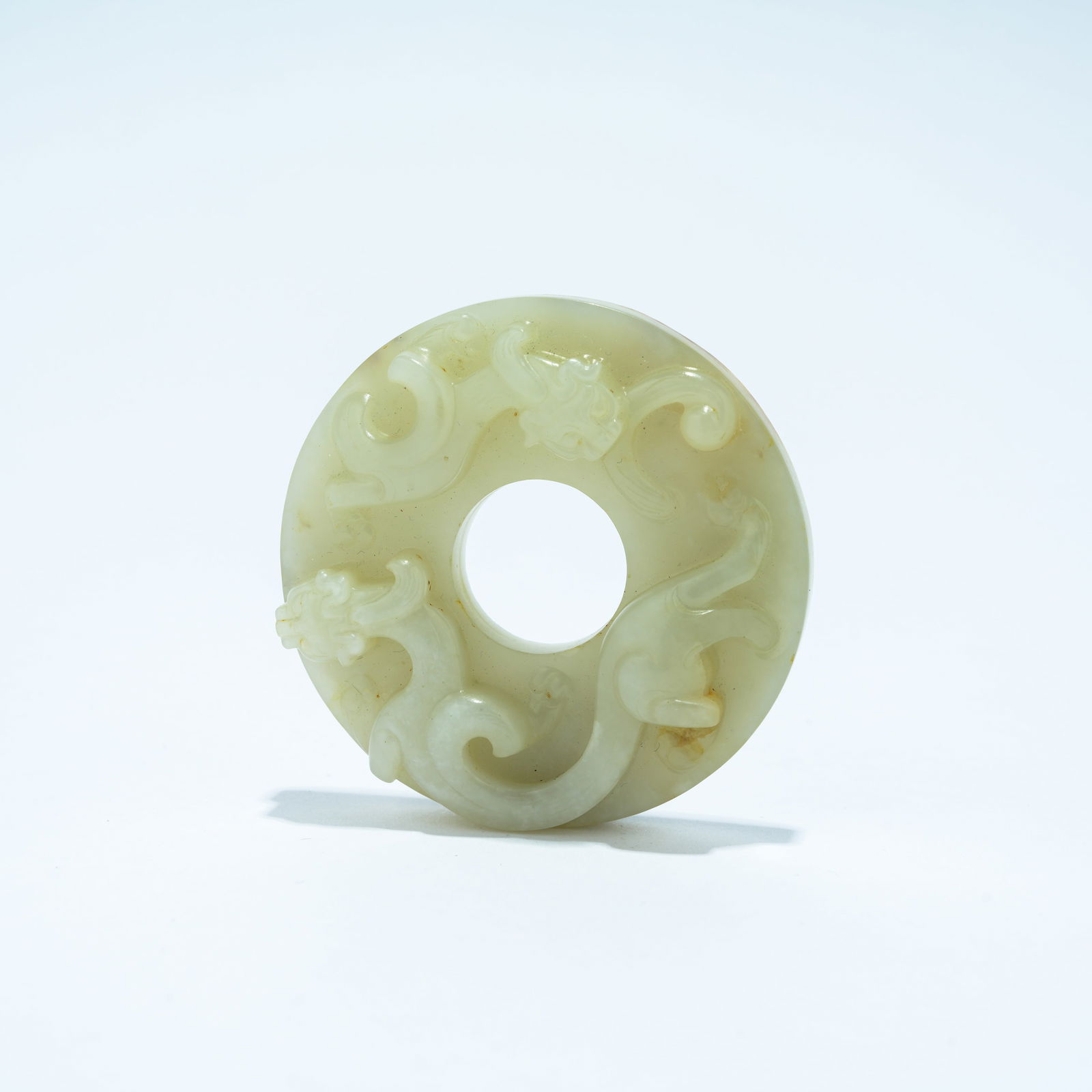 A HETIAN JADE CARVED BI DISC WITH CHI-DRAGON DESIGN (1 of 9)