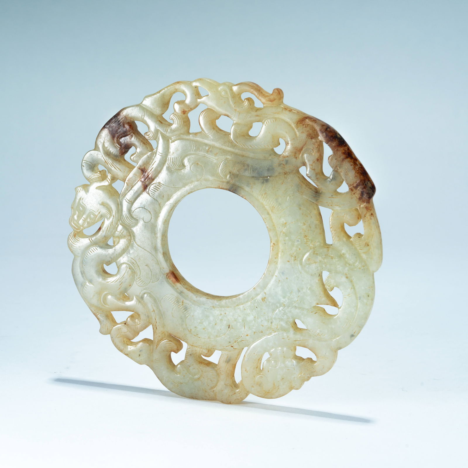 A ARCHAIC JADE CARVED HEART-SHAPED PENDANT WITH CHI-DRAGON DESIGN (1 of 10)