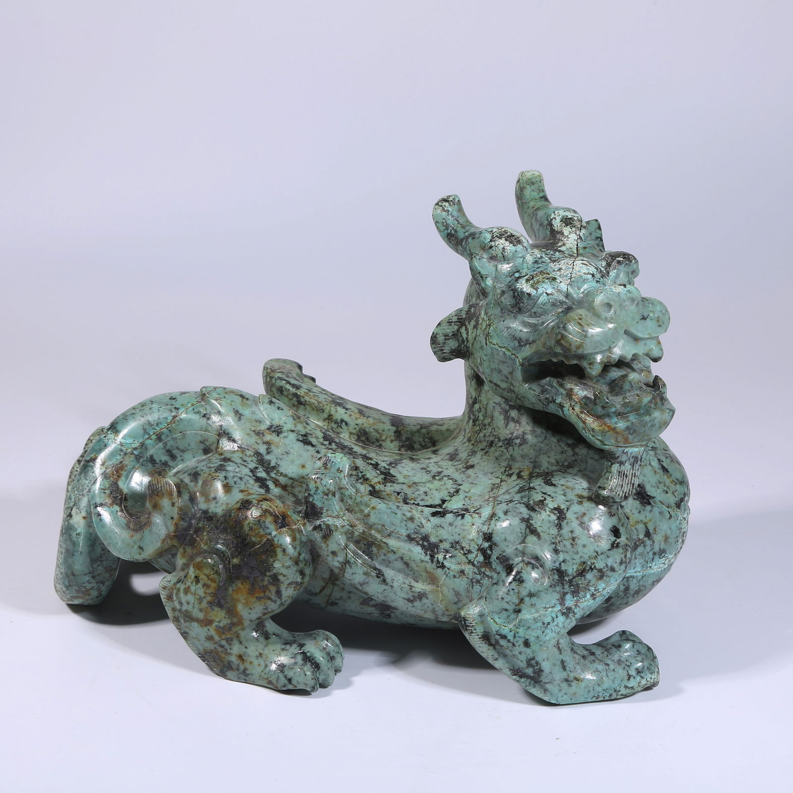 A TURQUOISE EVIL-REPELLING ORNAMENT: Turquoise Evil-Repelling Ornament