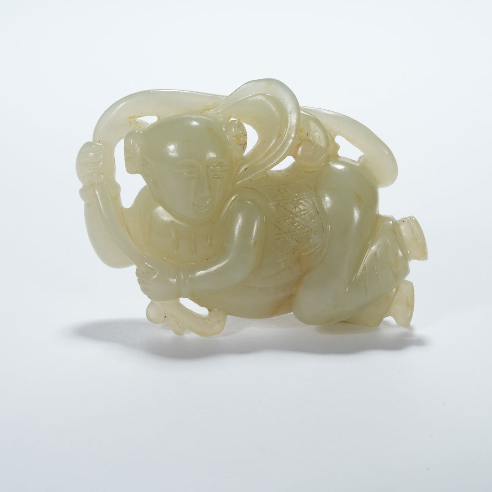 A HETIAN JADE CHILD FIGURINE: Hetian Jade Child Figurine