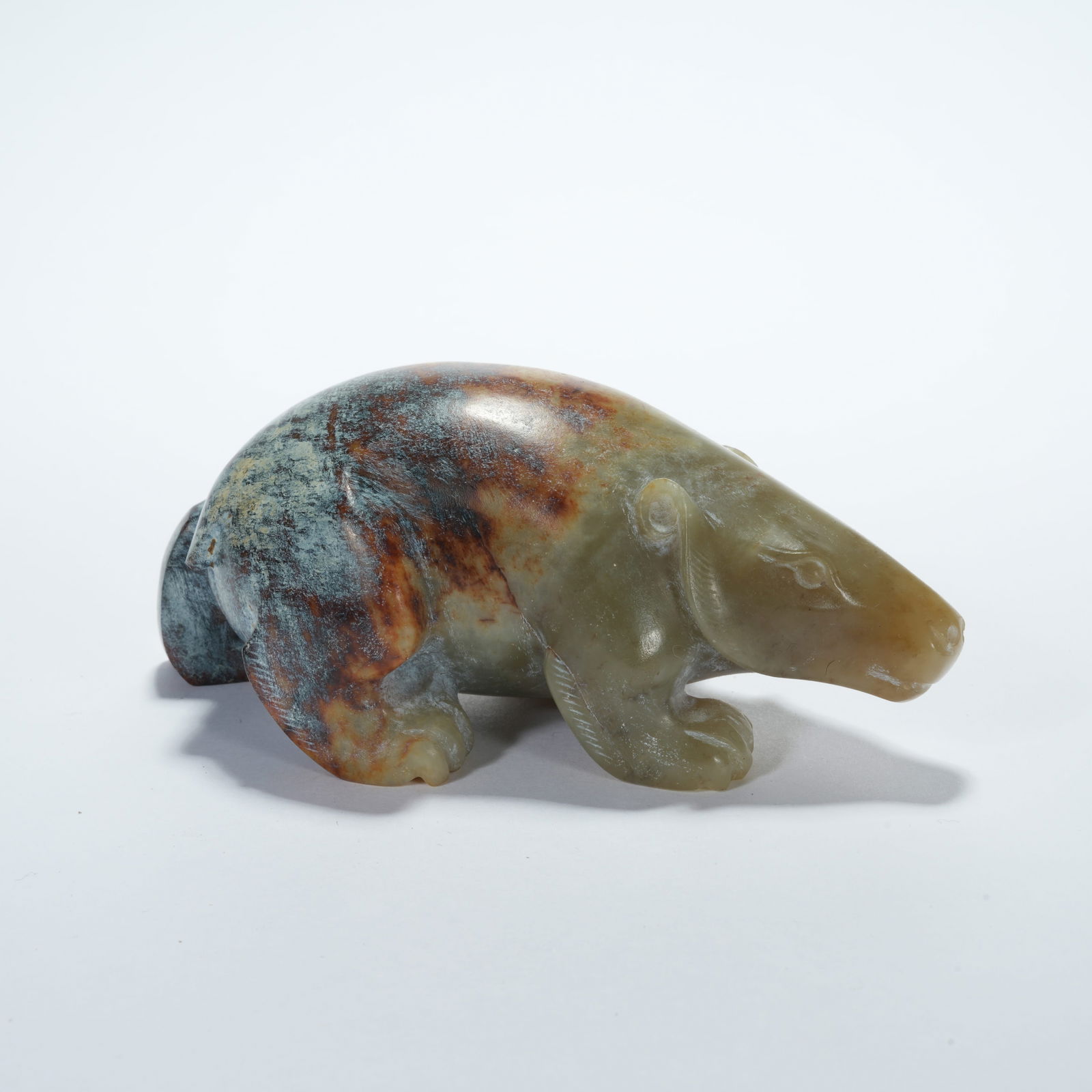 A HETIAN JADE BEAR FIGURINE: Hetian Jade Bear Figurine