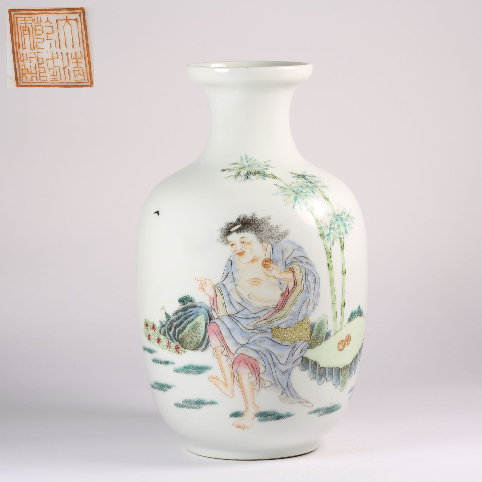 A FAMILLE ROSE MOUTH-TRIM VASE WITH "LIU HAI PLAYING WITH THE GOLDEN TOAD" MOTIF: Famille Rose Mouth-Trim Vase with "Liu Hai Playing with the Golden Toad" Motif
