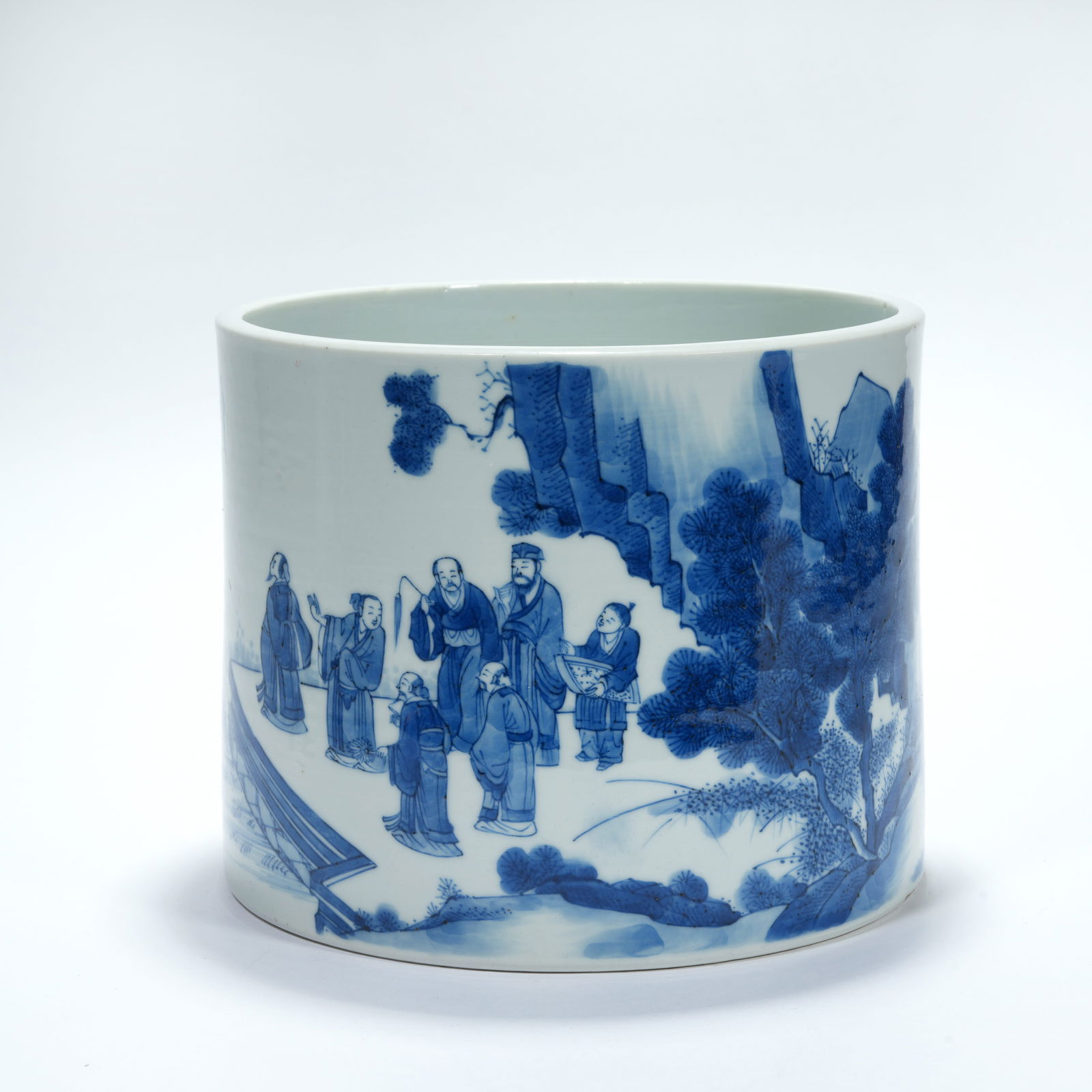 A BLUE-AND-WHITE LITERATI GATHERING MOTIF BRUSH POT (1 of 9)