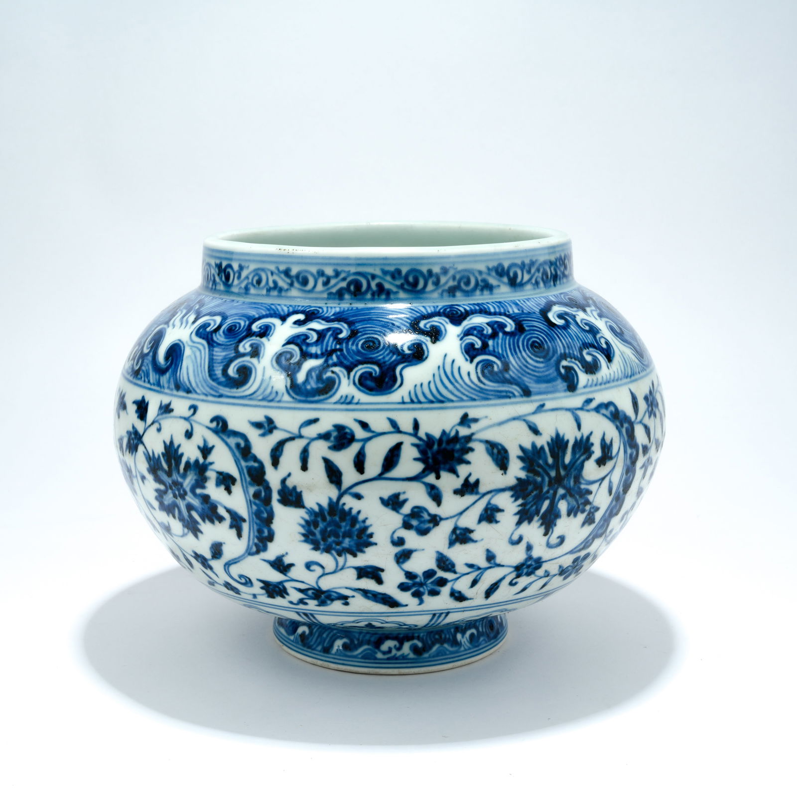 A BLUE-AND-WHITE JAR WITH INTERTWINED FLORAL SCROLL DESIGN (1 of 10)