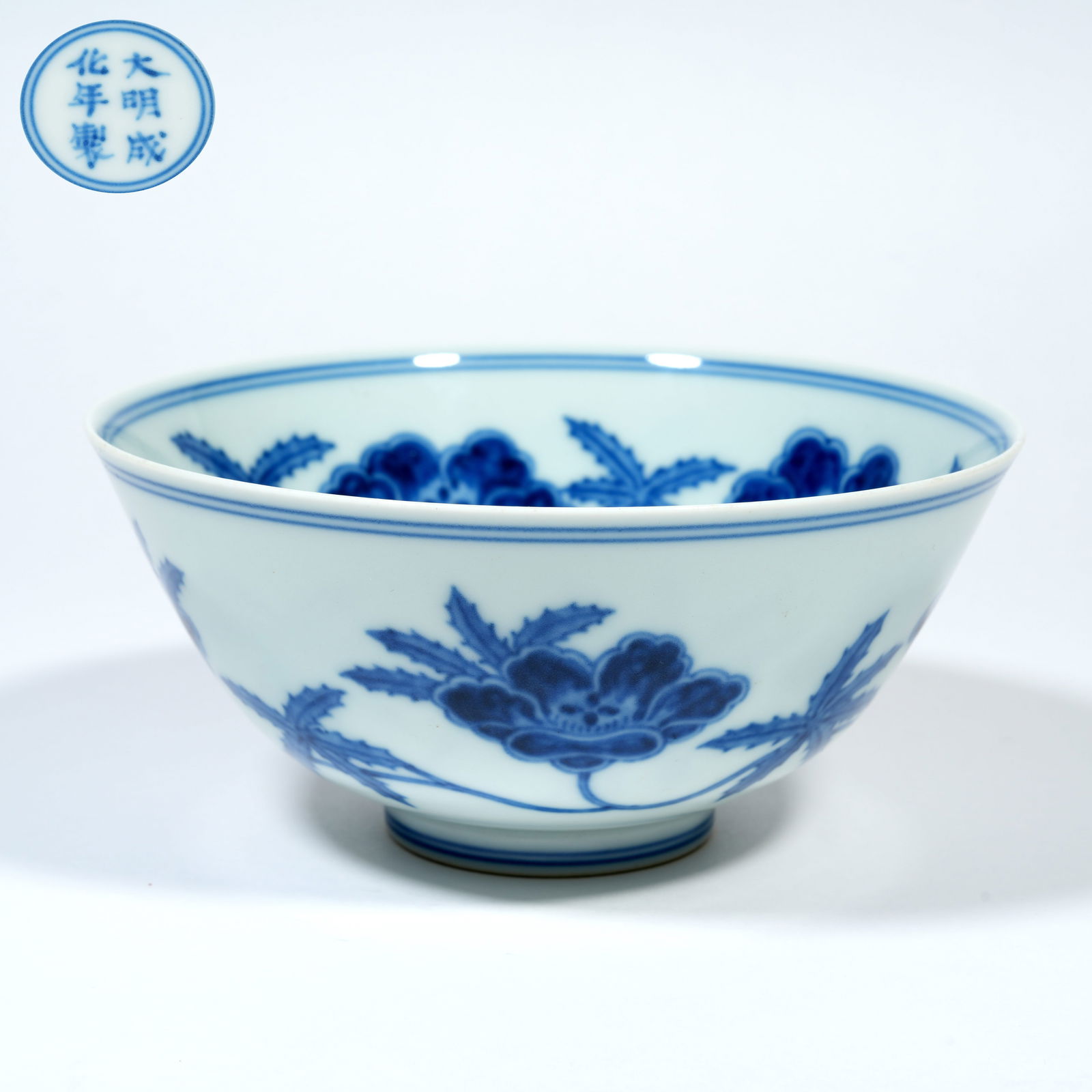 A BLUE-AND-WHITE BOWL WITH DAYLILY MOTIFS: Blue-and-White Bowl with Daylily Motifs