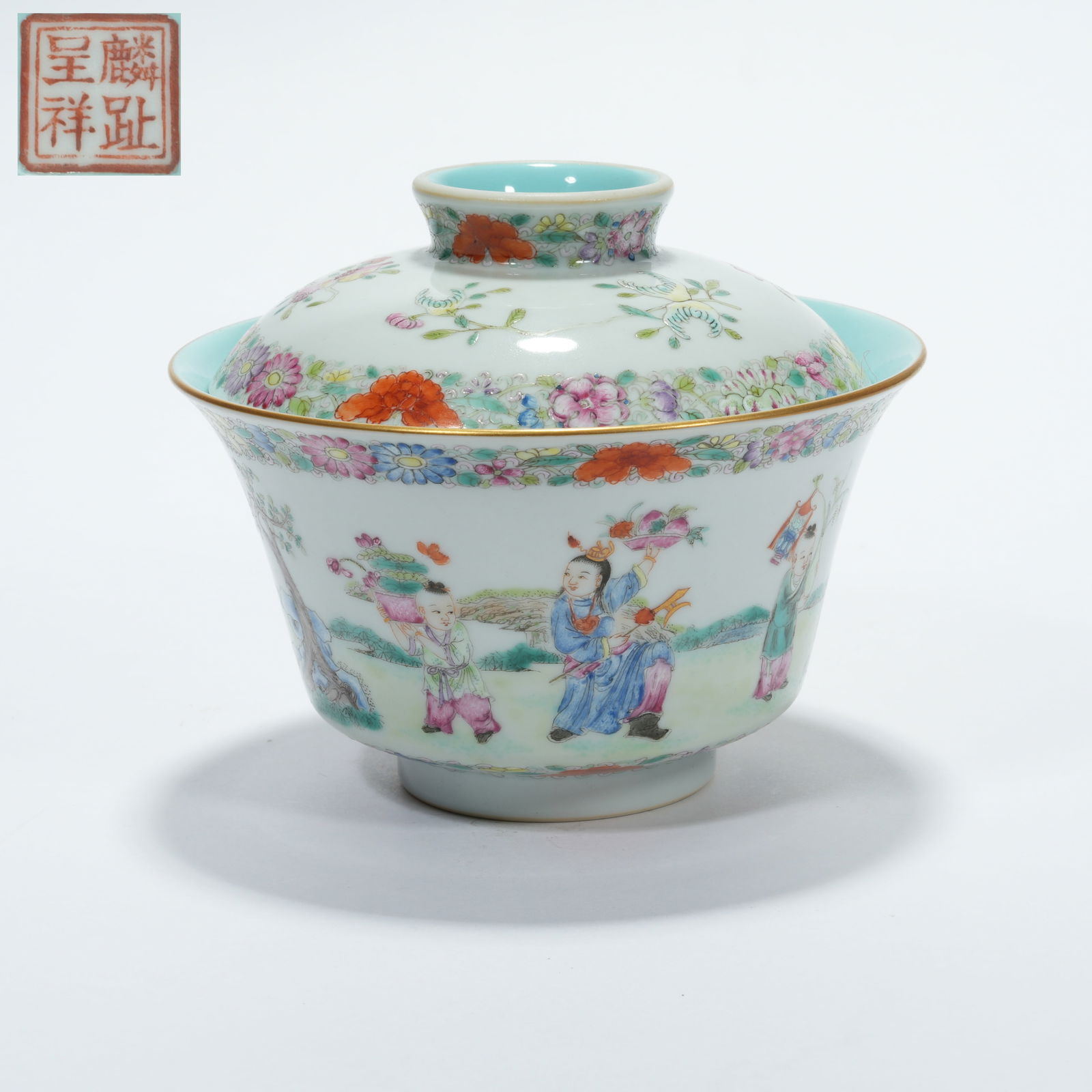 A FAMILLE ROSE COVERED BOWL WITH PLAYING CHILDREN MOTIF: Famille Rose Covered Bowl with Playing Children Motif
