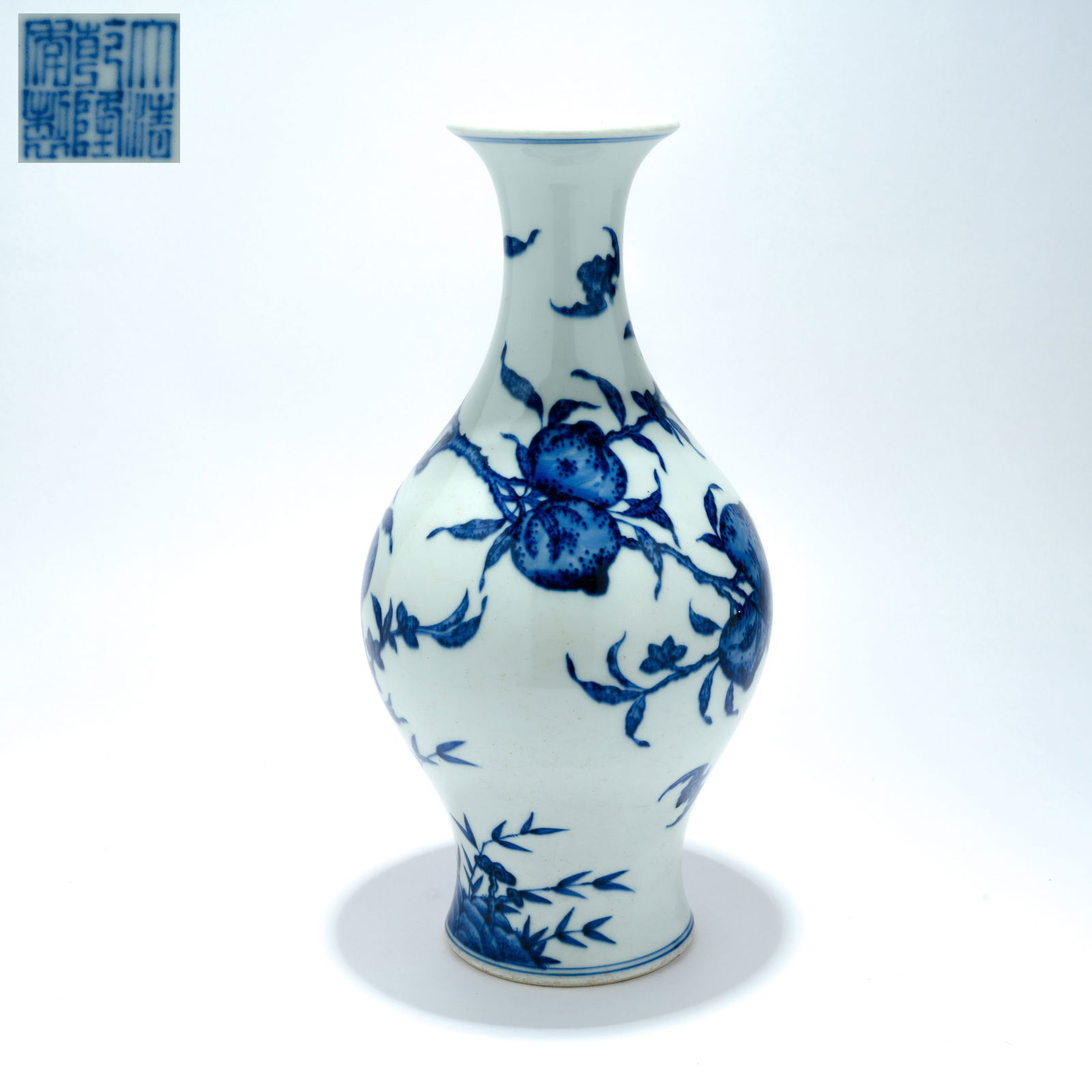 A BLUE-AND-WHITE OLIVE-SHAPED VASE WITH "GOOD FORTUNE AND LONGEVITY" MOTIF: Blue-and-White Olive-Shaped Vase with "Good Fortune and Longevity" Motif