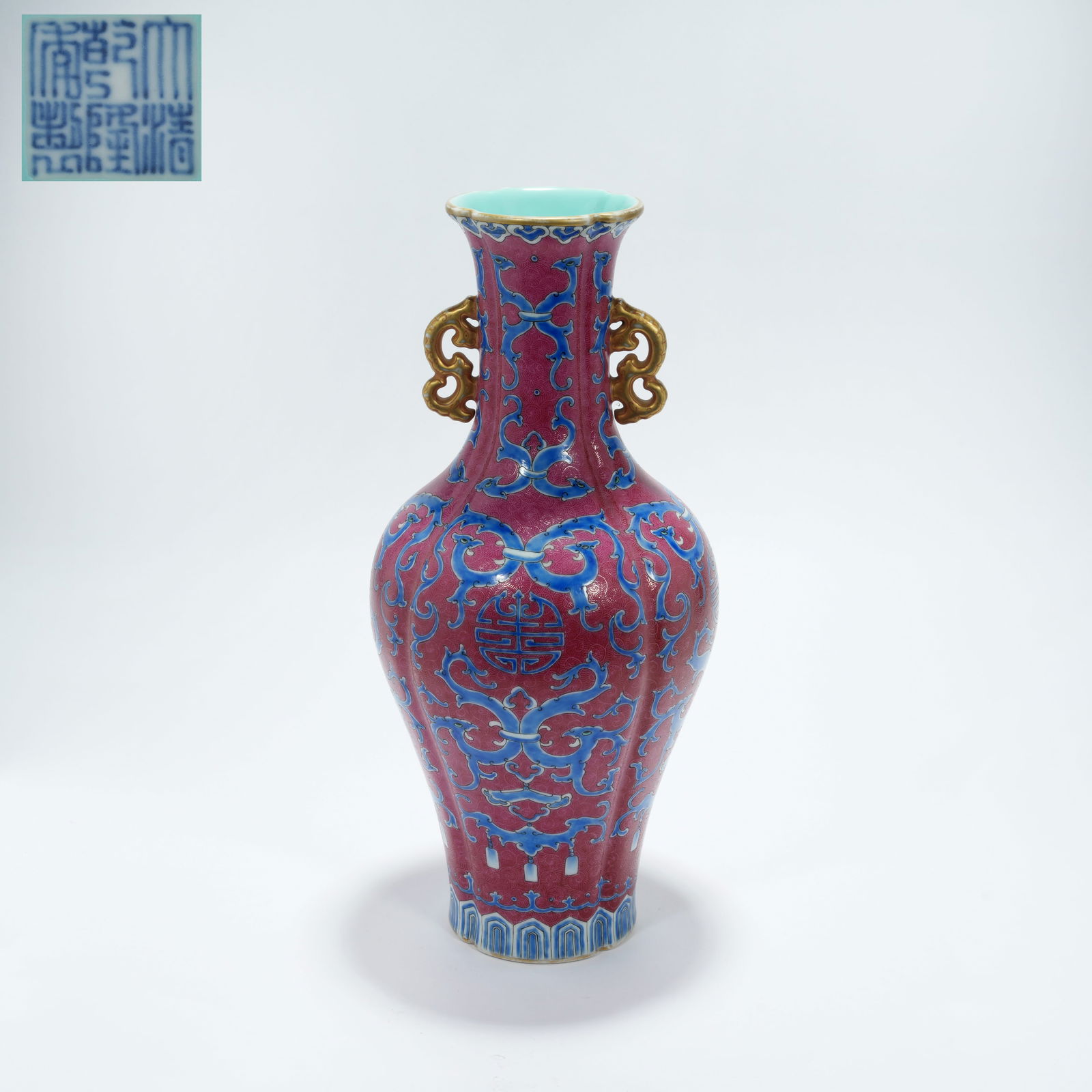 A ROUGE DE FER DOUBLE-HANDLED ROLLER-PATTERN VASE: Rouge de Fer Double-Handled Roller-Pattern Vase