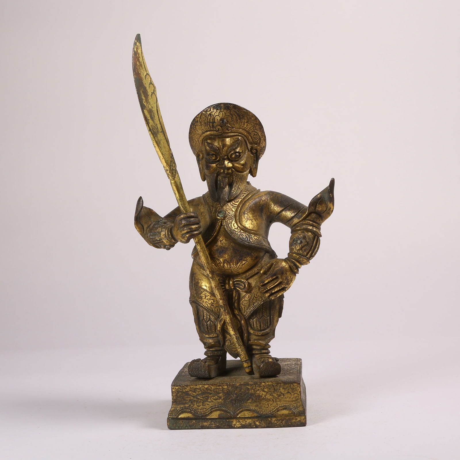 A GILT BRONZE STANDING STATUE OF ZHOU CANG: Gilt Bronze Standing Statue of Zhou Cang