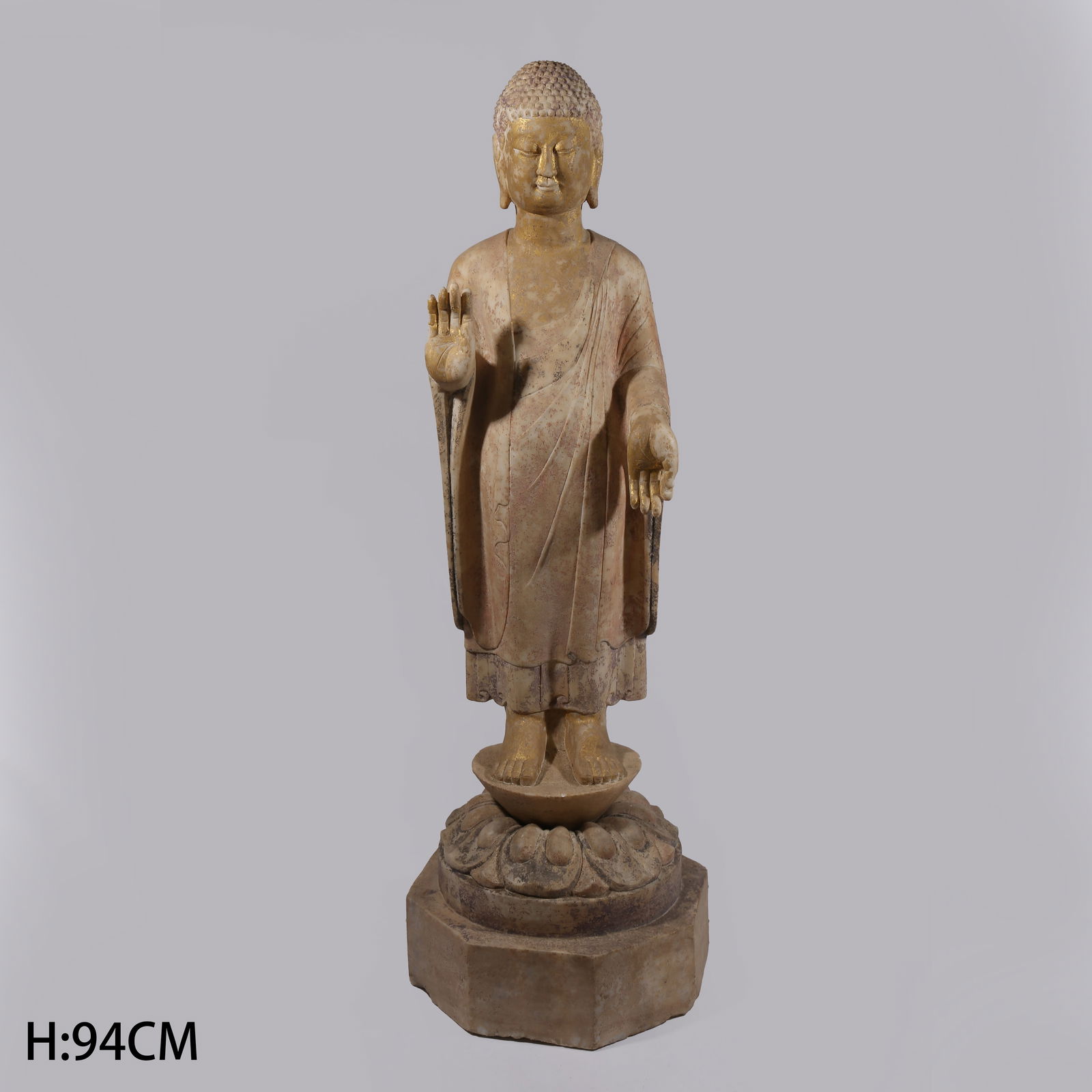 A PAINTED WHITE MARBLE STANDING FIGURE OF THE BUDDHA: Painted white marble standing figure of the Buddha