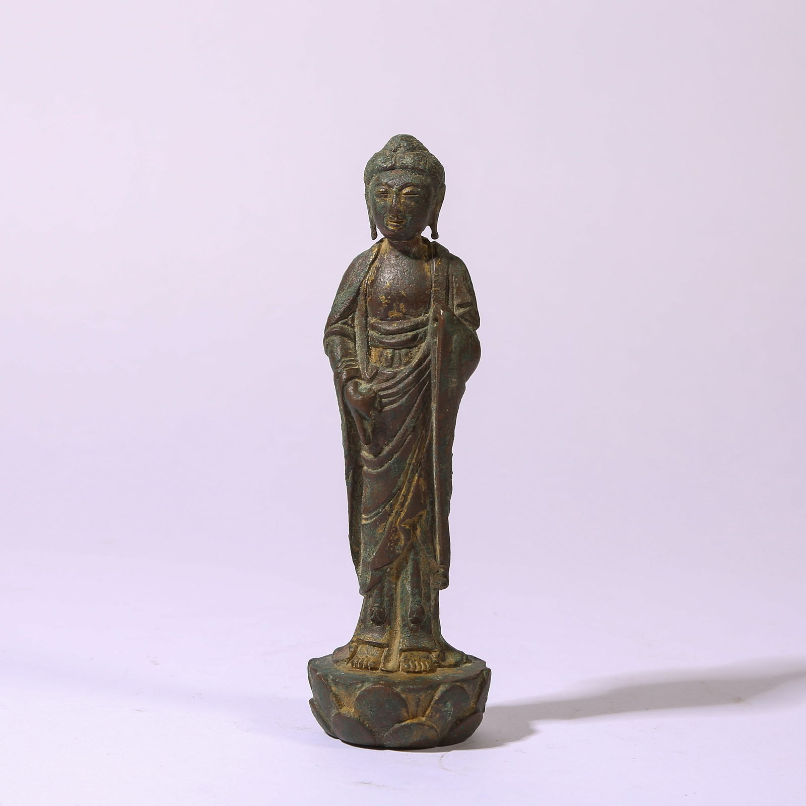 A STANDING FIGURE OF SHAKYAMUNI BUDDHA IN BRONZE (1 of 8)