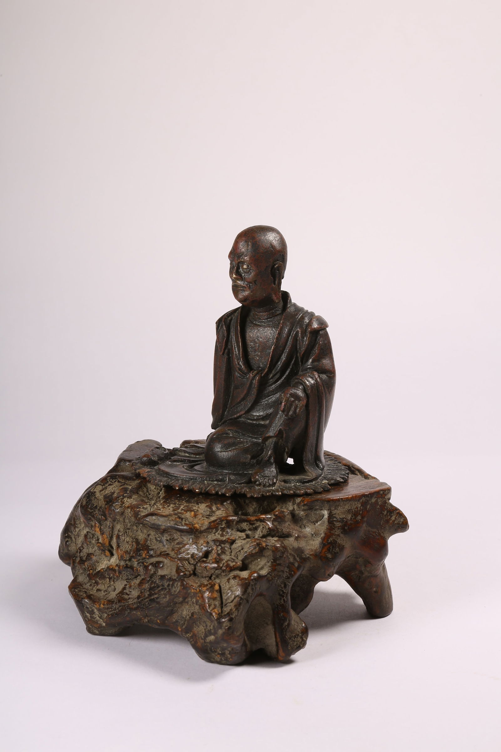 A BRONZE SEATED ARHAT - 3