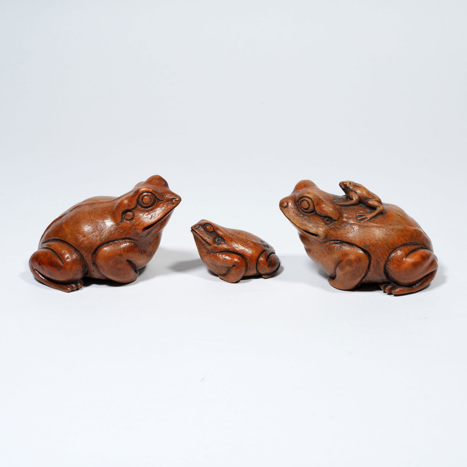 A SET OF BAMBOO ROOT CARVINGS IN "GUGU BRINGS WEALTH" FORM: Set of Bamboo Root Carvings in "Gugu Brings Wealth" Form