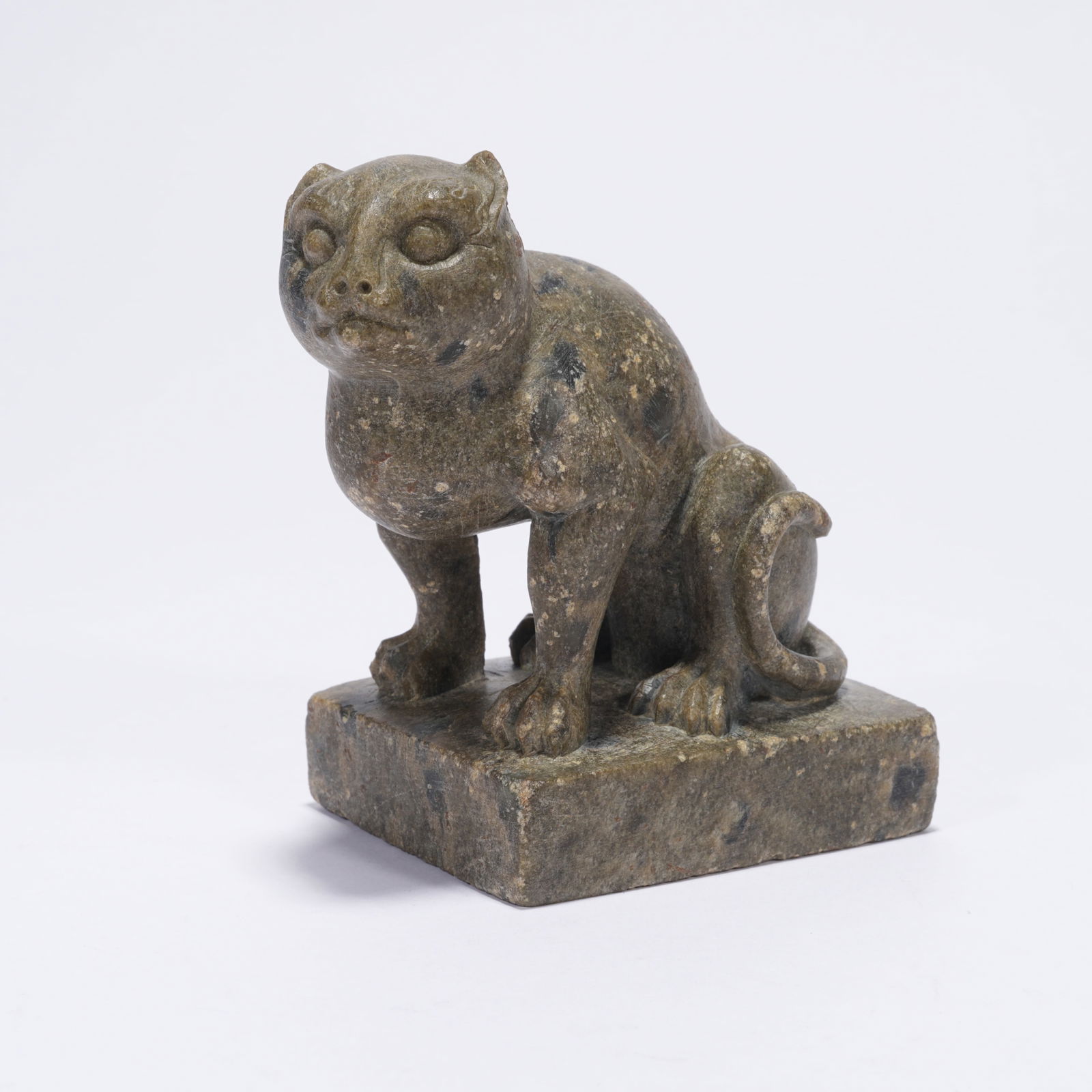 A LEOPARD-PATTERN STONE CAT FIGURINE (1 of 10)
