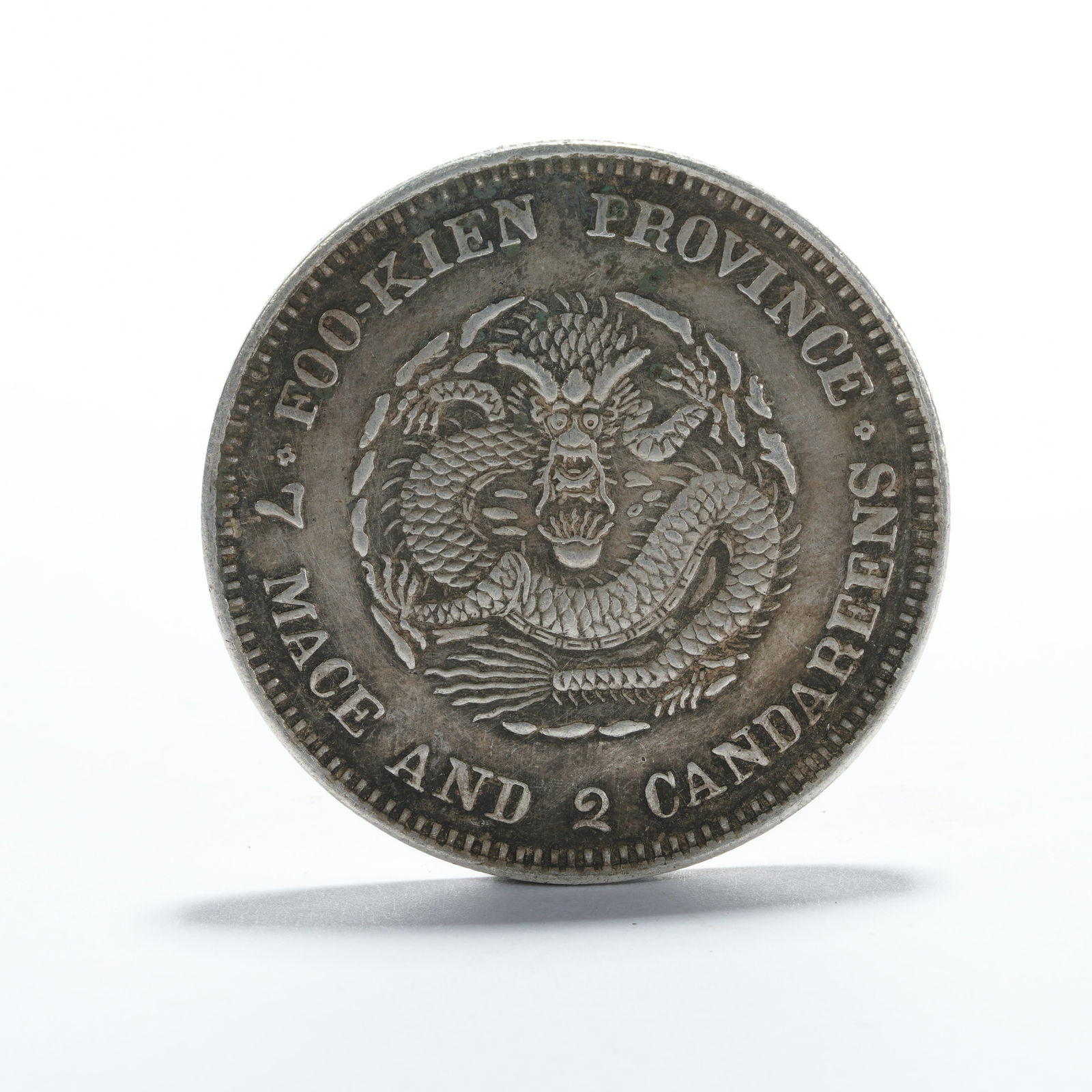 A SILVER DOLLAR COIN - 3
